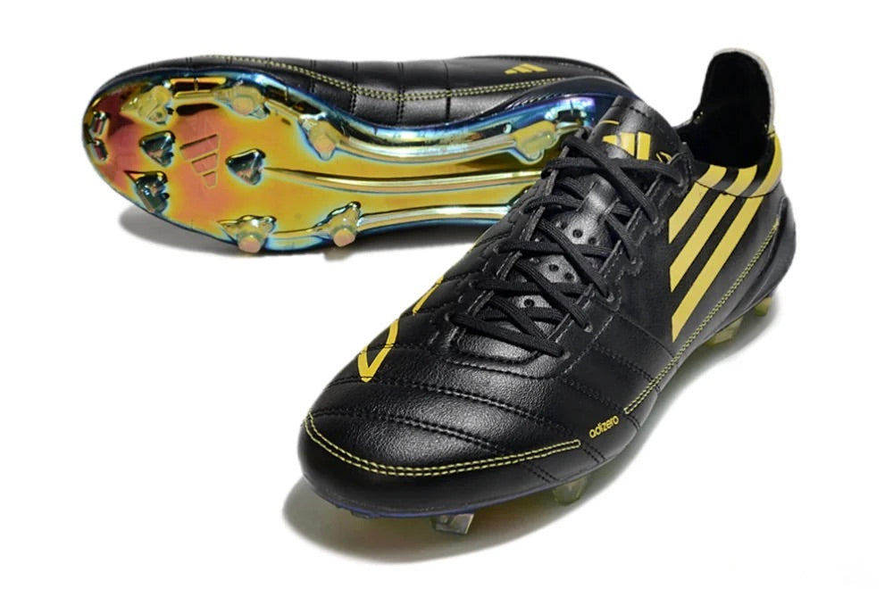 Guayos F50 Elite FG Dorado Negro